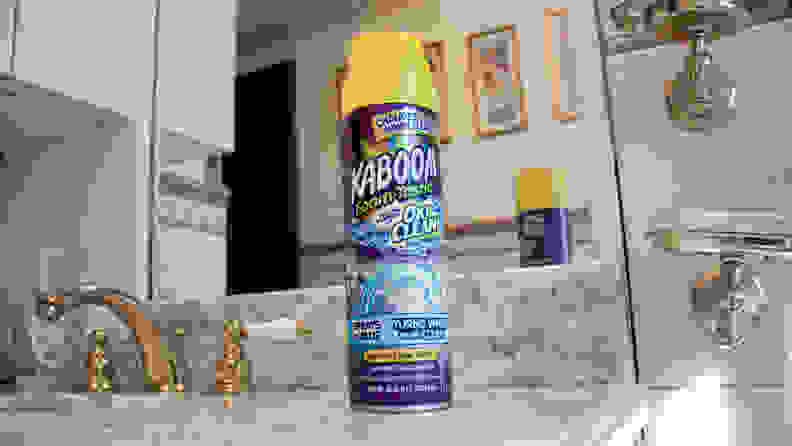 A can of Kaboom cleaner sits on a bathroom sink.